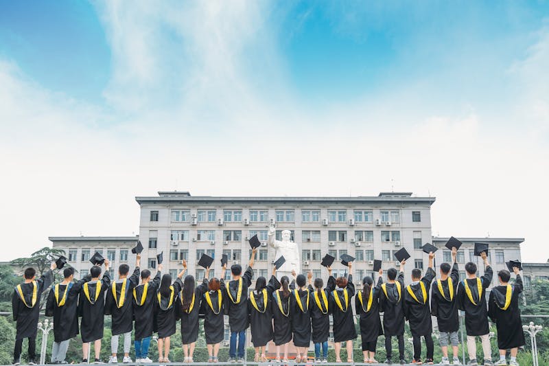 Graduation celebration with graduates and families